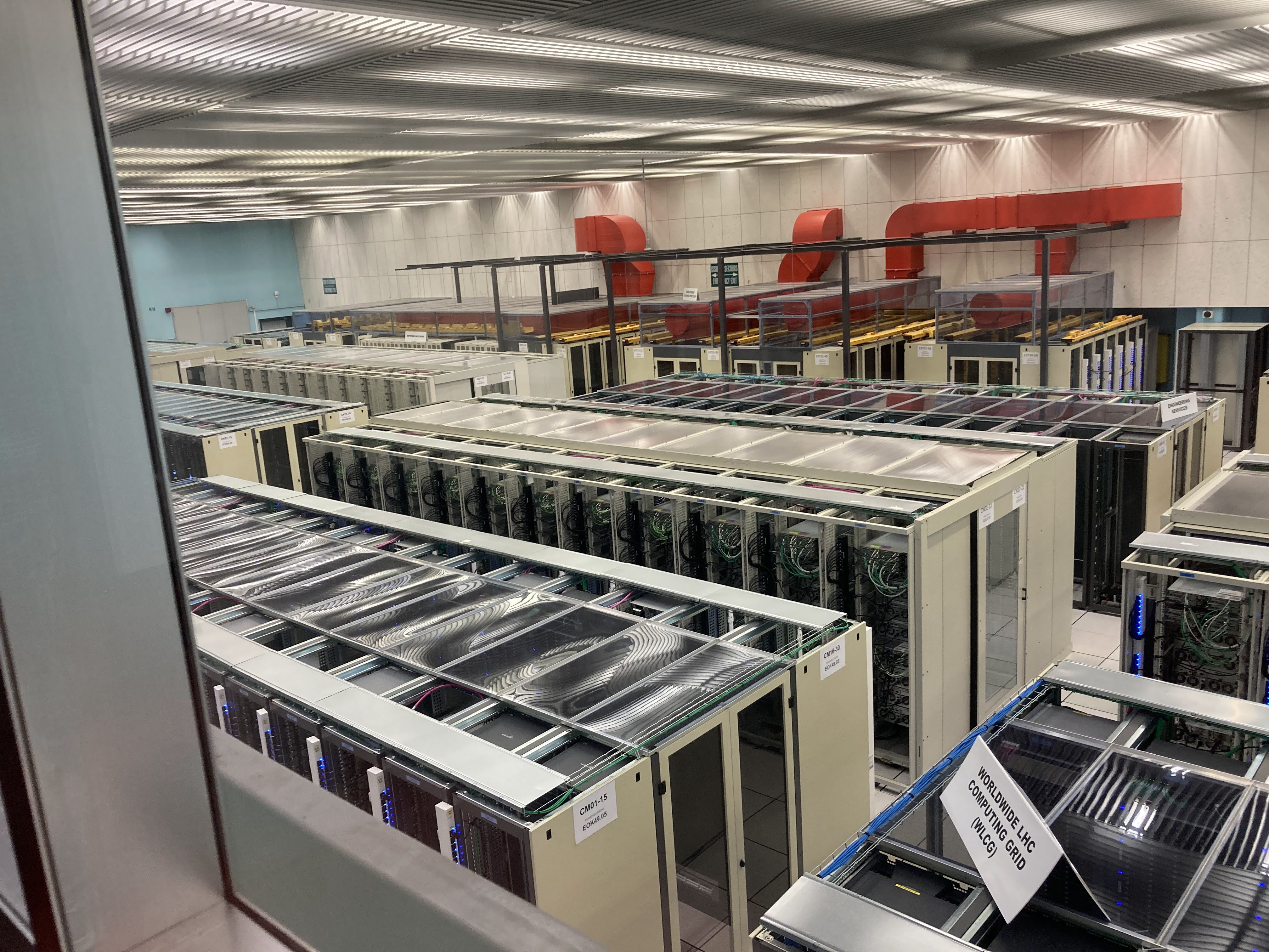 CERN data center with rows of computing racks.