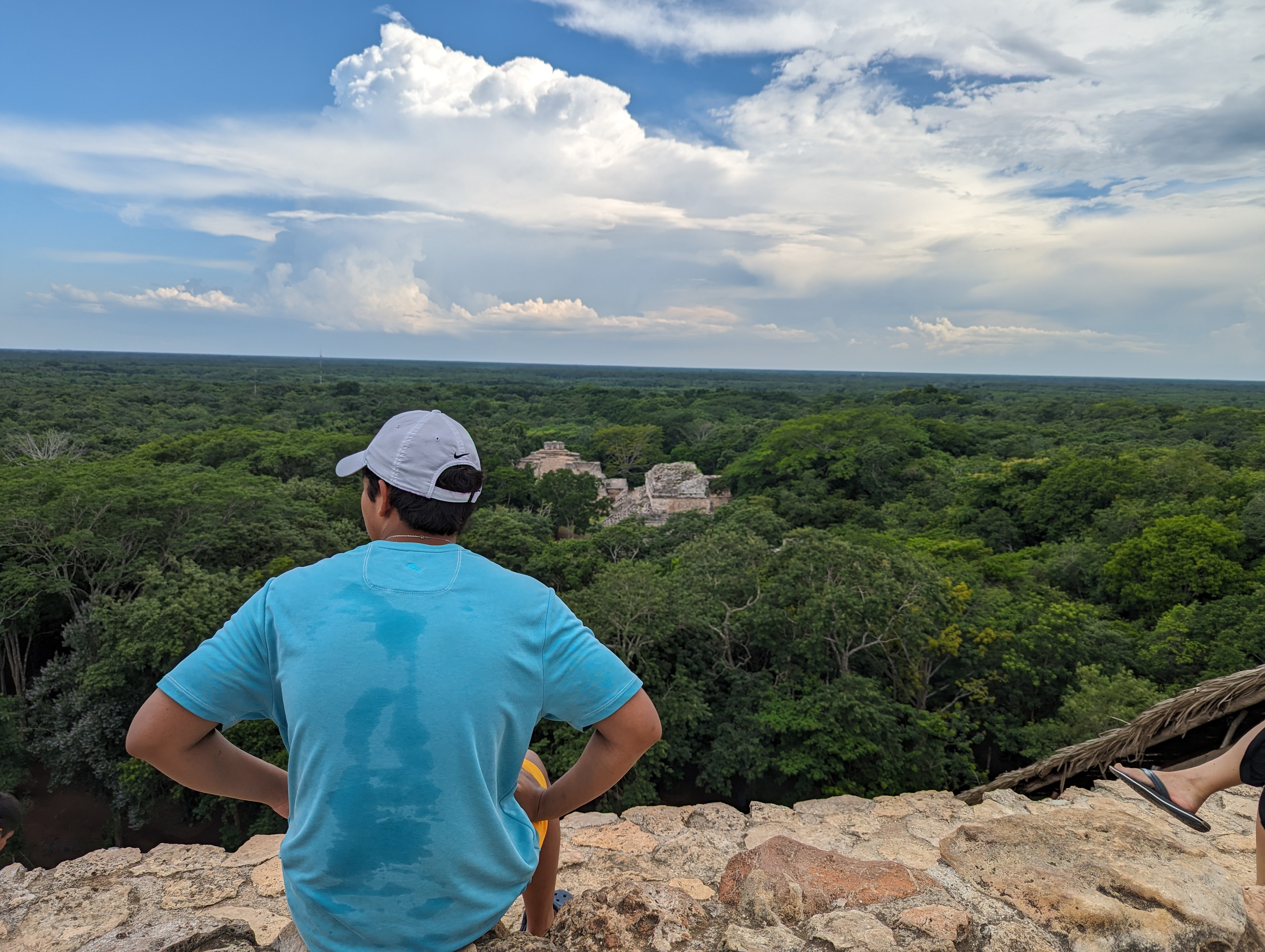 David overlooking the forest and ruins of Ek Balam in Yucatán.